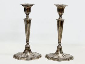 A pair of large sterling silver Hawksworth, Eyre & Co Ltd candlesticks. Early 20th century, 1901.