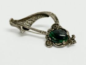 An Irish brooch stamped Miracle. 6cm