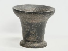 A large 19th century cast iron mortar. 34x30cm