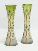 A pair of late 19th/early 20th century hand painted glass vases. 21cm