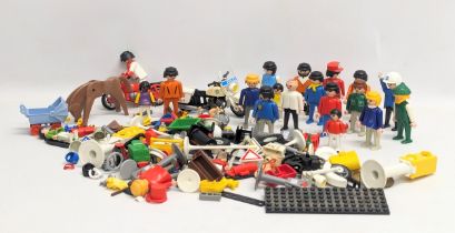 A collection of vintage Playmobil figures and accessories