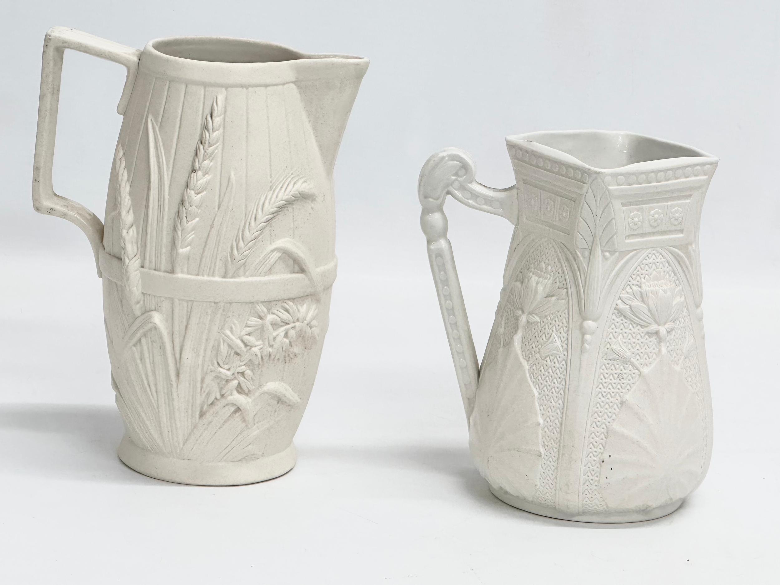 2 mid 19th century Copeland Parian Ware jugs. A Harvest Barrel jug 13x18cm. - Image 4 of 6