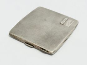 A silver cigarette case. 123.55 grams.