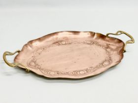 An early 20th century Joseph Sankey & Sons Art Nouveau copper tray with brass handles. Circa 1900-