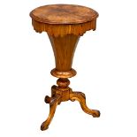 A Victorian walnut pedestal work table/storage table on carved cabriole legs. 46x72cm