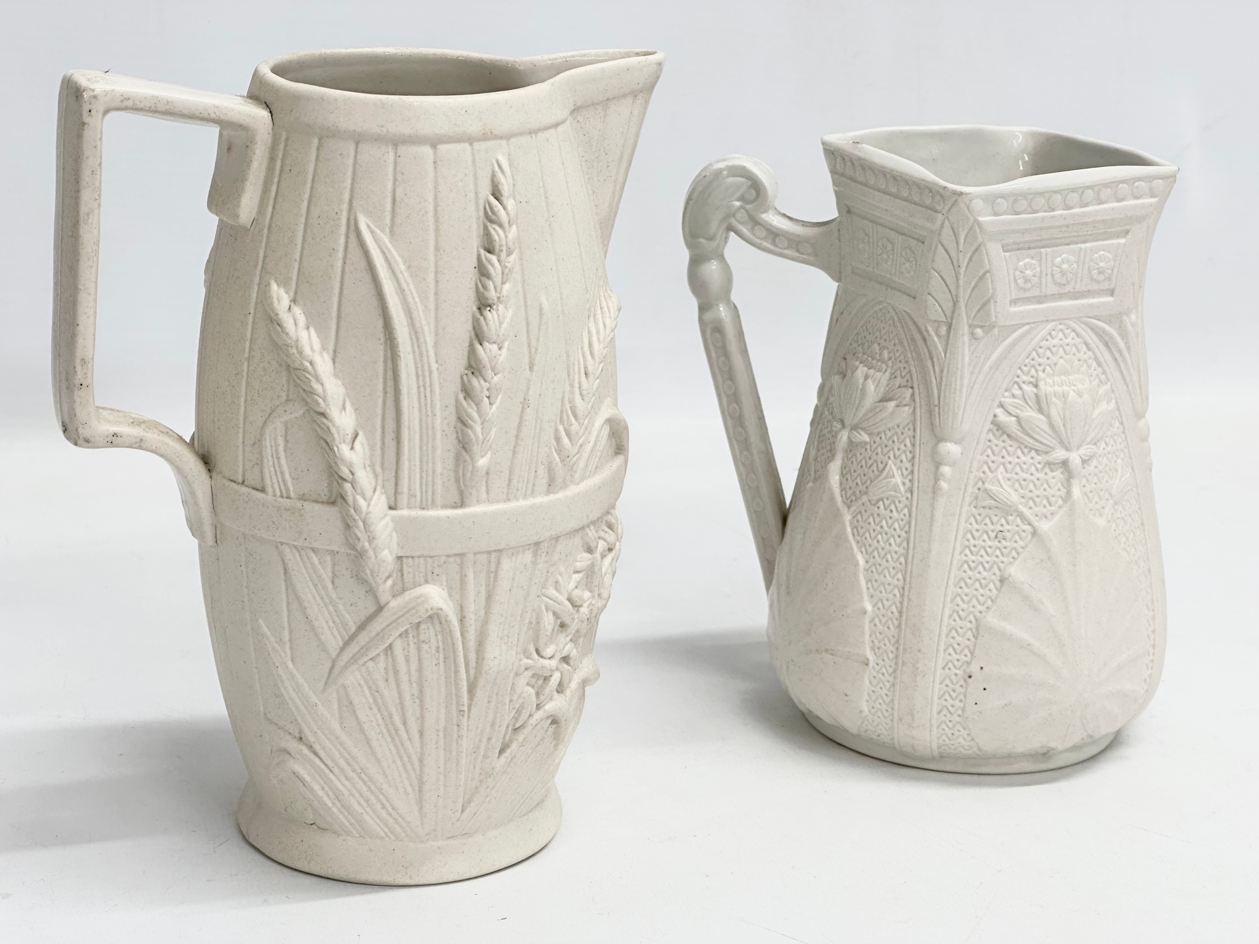 2 mid 19th century Copeland Parian Ware jugs. A Harvest Barrel jug 13x18cm. - Image 6 of 6