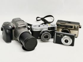 4 cameras. An Olympus IS-300 camera. An Olympus Trip 35 camera etc.