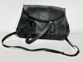 A leather handbag by Radley.