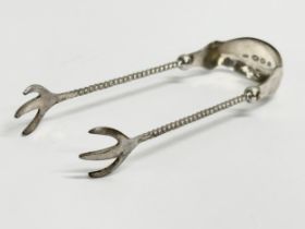 Dutch silver sugar tongs. 13.48 grams. 10cm