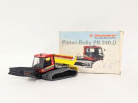 A vintage Kässbohrer Pisten Bully PB 240 D model by Conrad. West Germany. Model number 5201. 1:43.