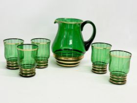 A 1970’s Mid Century Bristol Green drinks set. Jug 17x18cm. Glasses 10.5cm
