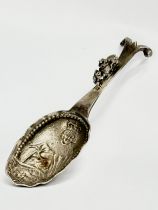 A silver wine tasting spoon. Depicting Edward V. London. Faded makers mark, M??. 35.68 grams. 12cm