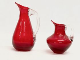 2 Ruby Glass jugs designed by Geoffrey Baxter for Whitefriars. 17cm