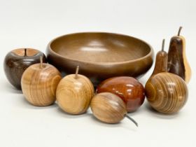 A set of good quality carved wooden fruit in bowl. Including Laburnum, Walnut, Padauk, Chestnut,