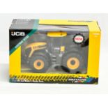 A new Britains JCB Fastrac 8330 tractor with box. 25x13x16cm