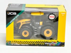 A new Britains JCB Fastrac 8330 tractor with box. 25x13x16cm