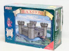 A large unused Imex Model Company INC Medieval Stone Castle Series ‘Blackstone Castle’ with box