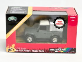 A new Britains Land Rover Defender 90 with box. 20x10x11cm