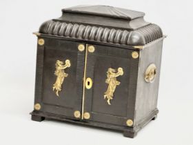 A large late 19th century leather and brass bound multi purpose tabletop cabinet. Circa 1880-1900.