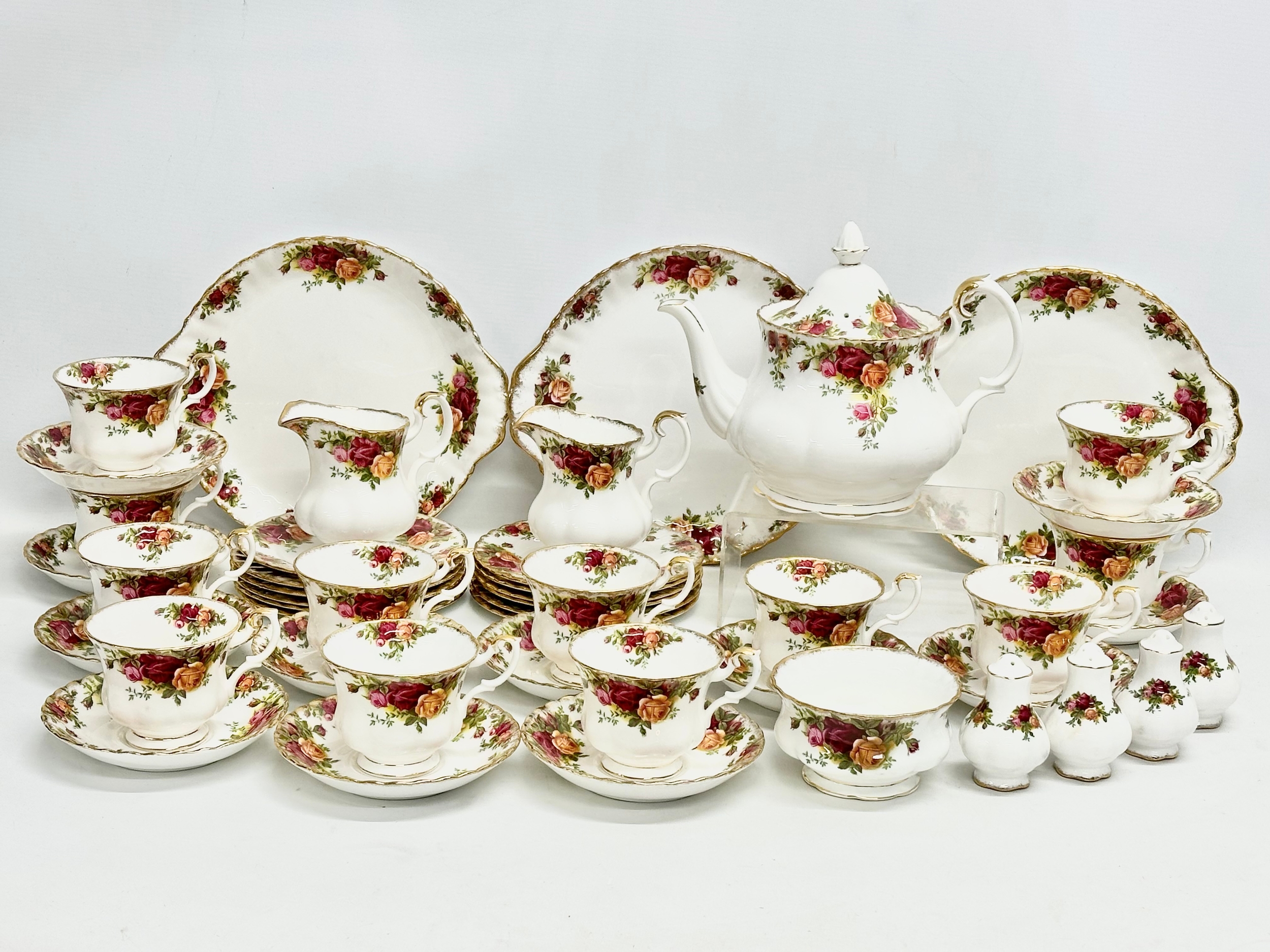 A 47 piece Royal Albert ‘Old Country Roses’ tea service. 2 pairs of salt and pepper shakers. A