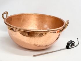 A large mid 19th century French heavy copper whisky mixing bowl. 58x54x28cm