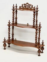 A Victorian walnut 3 tier tabletop/wall hanging whatnot with Barley Twist supports. 56x19x65cm
