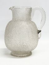 A large 19th century Crackle Glass water jug. Circa 1860-1880. 18x14x21cm