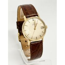 A 1960’s Omega 9ct gold gents watch