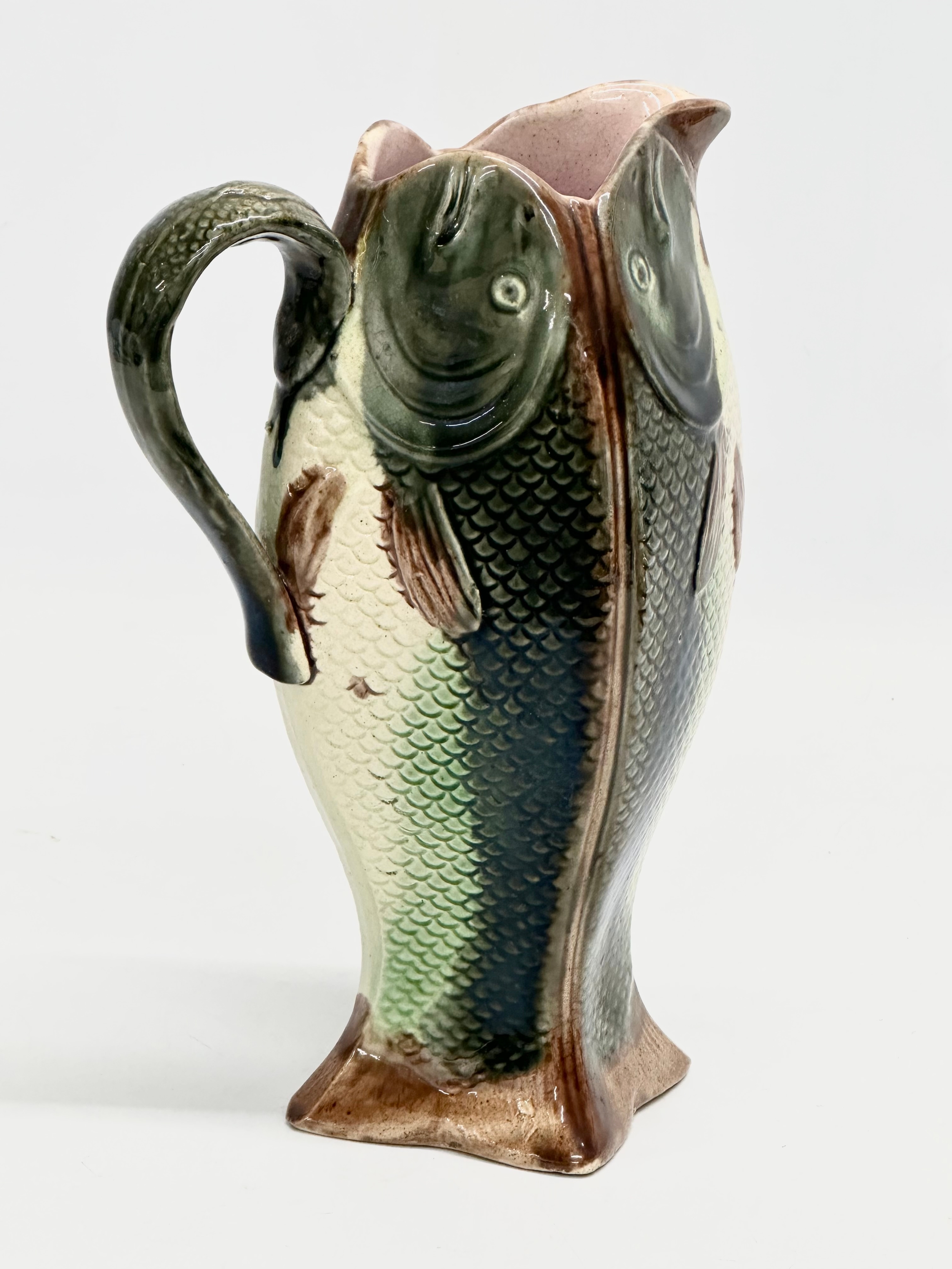 A late 19th century English Majolica 4 sided fish jug. 14x11x22cm - Image 3 of 4