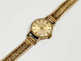A vintage 9ct gold Walker & Hall watch. 17.93 grams.