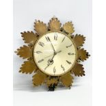 A 1960’s Mid Century sunburst wall clock by Metamec. 32cm