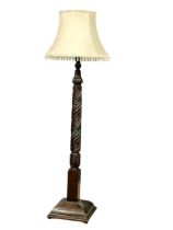 A large good quality early 20th century carved standard lamp. 188cm