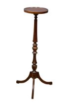 A Regency style mahogany torchiere. 100cm (2)