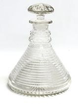 A late 19th/early 20th century George III Revival ships decanter, with slice sharp cut sides and 2