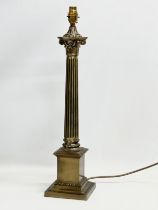 A large brass table lamp with Corinthian style column. 59cm