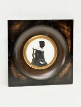 A late 19th century hand painted silhouette picture. 17x17cm