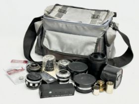 A collection of camera lenses etc.