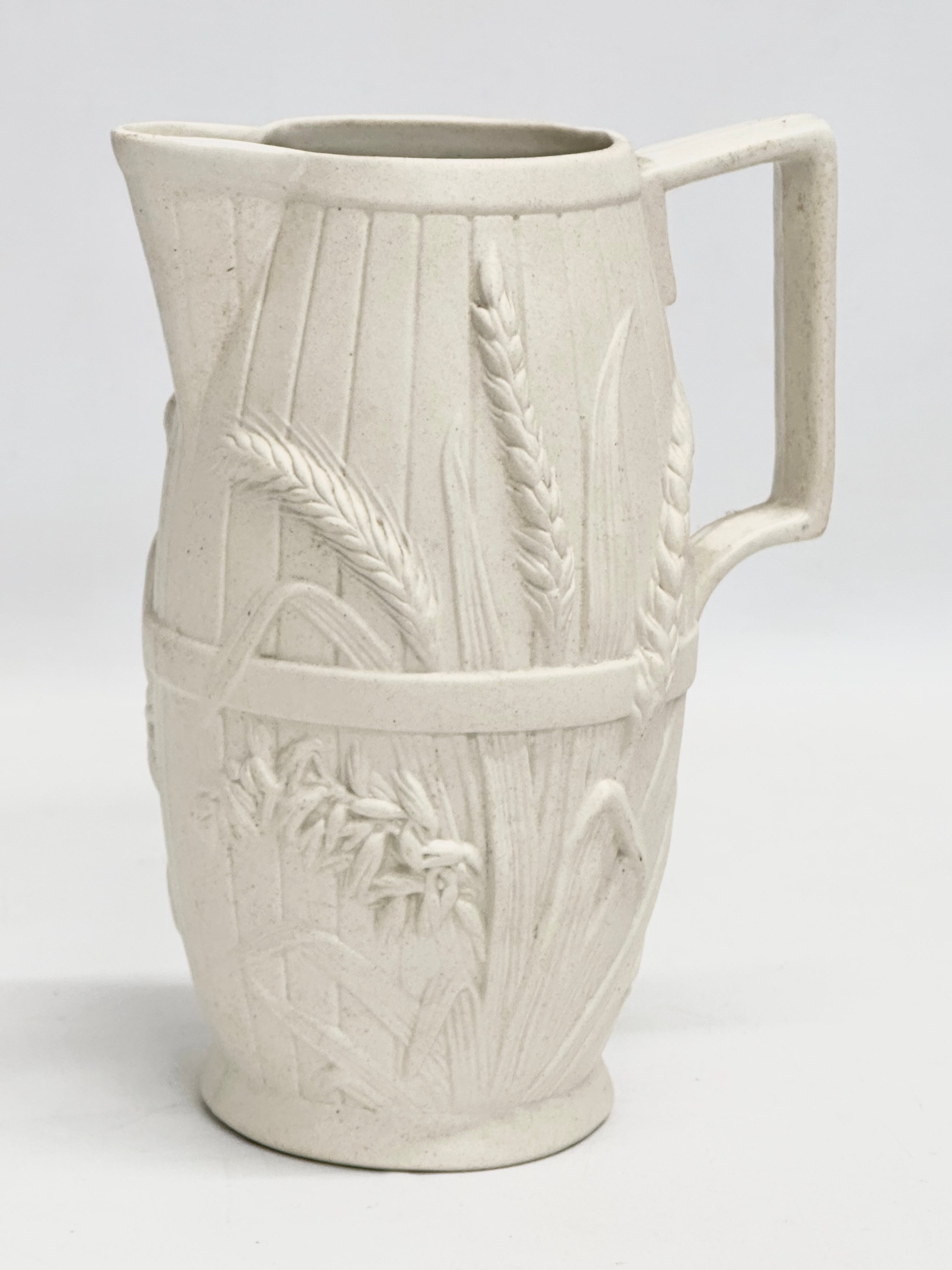 2 mid 19th century Copeland Parian Ware jugs. A Harvest Barrel jug 13x18cm. - Image 3 of 6