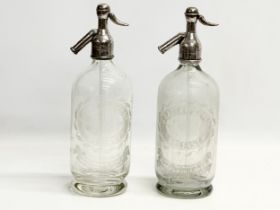 A pair of vintage Grattan & Co LTD porcelain lined silver plated soda syphons. Belfast. 31cm