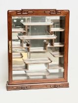 A Chinese padauk wall hanging mirror back display cabinet with glazed door. 48x11x61cm