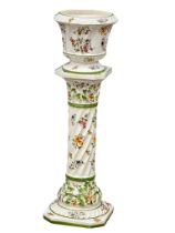 A large Capodimonte pottery jardiniere on stand. 94cm