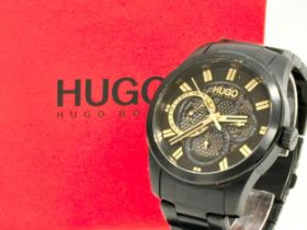 A gents Hugo Boss ‘Skeleton’ watch with box. HU 433.1.34.3568 1.172.201