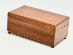 An early 20th century mahogany musical storage box. Working. 19.5x10.5x8.5cm.