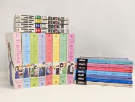 A collection of Manga books, including Fruits Basket Collectors Edition 1 to 8, Usagi Yojimbo by