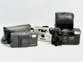 3 cameras. An Olympus AF-1 camera with case. A Hanimex 35HF camera with case. A Fujifilm Nexia