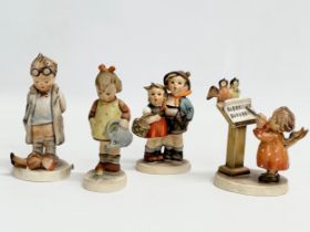 4 West German M.J. Hummel Goebel pottery figurines.