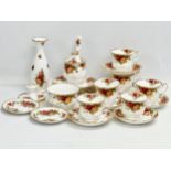 A 25 piece 1962 Royal Albert ‘Old Country Roses’ tea set. Rose vase 19cm. A sugar jar with lid and