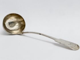A small silver ladle. 32.35 grams. 17cm