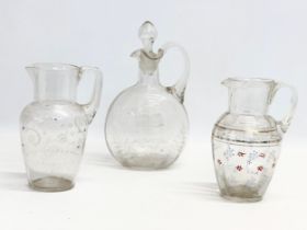 3 pieces of Victorian glassware. 2 Victorian embossed painted jugs 12x17cm. A Victorian etched glass