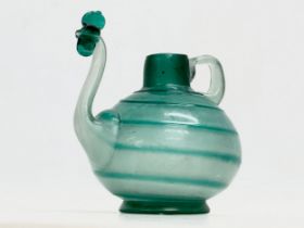 A rare 18th century handblown vessel ewer. Circa 1760-1800. 15x12.5x17cm